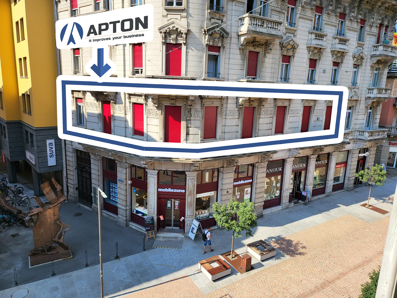 The APTON SAGL office in Lugano, with the company logo marking the floor it occupies.