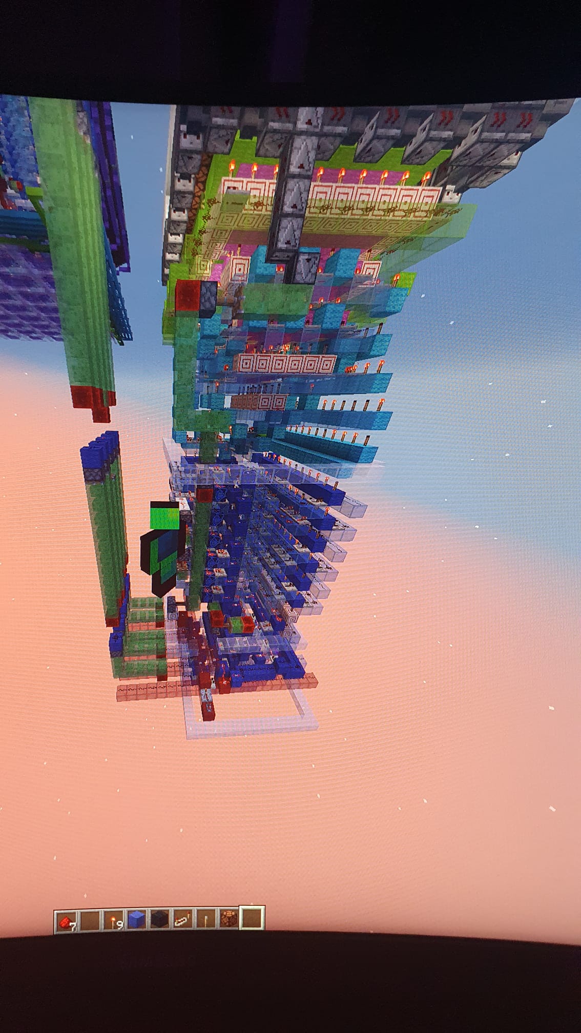 The stacked layers of redstone logic beneath the board.