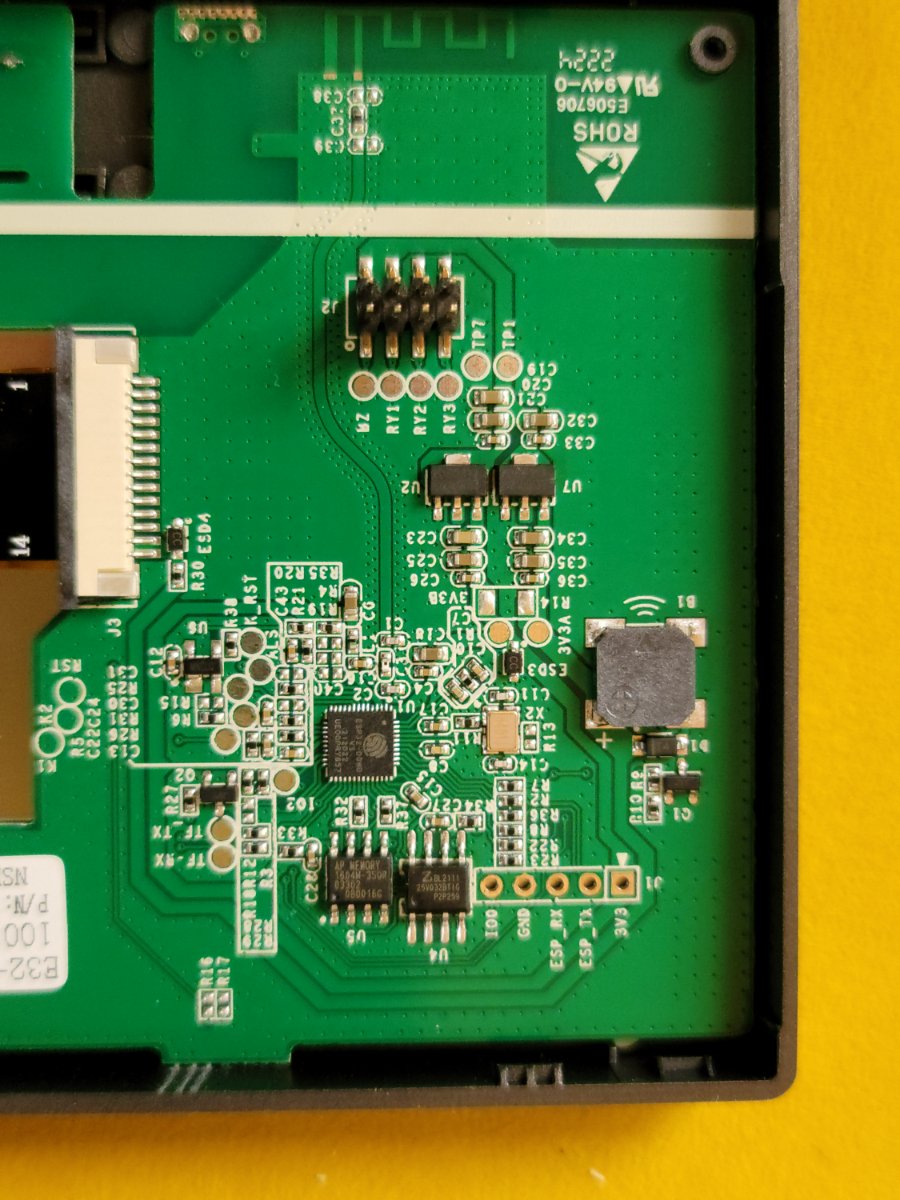 The NSPanel opened up: main board with the ESP32, relays, buzzer and the ESP_RX/ESP_TX header.